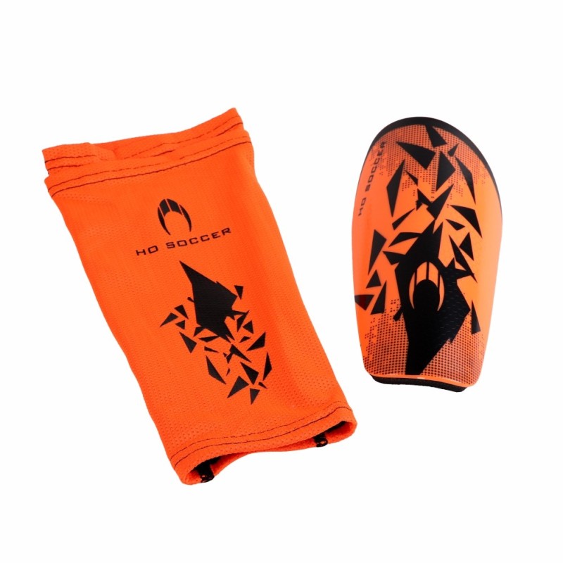 Ho soccer Espinillera Rebel naranja Descuentos del mes