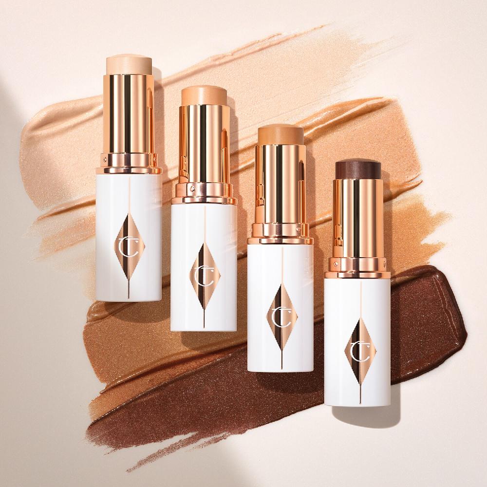 Charlotte Tilbury Unreal Skin Sheer Glow Tint - Stick base de maquillaje hidratante Envío gratis