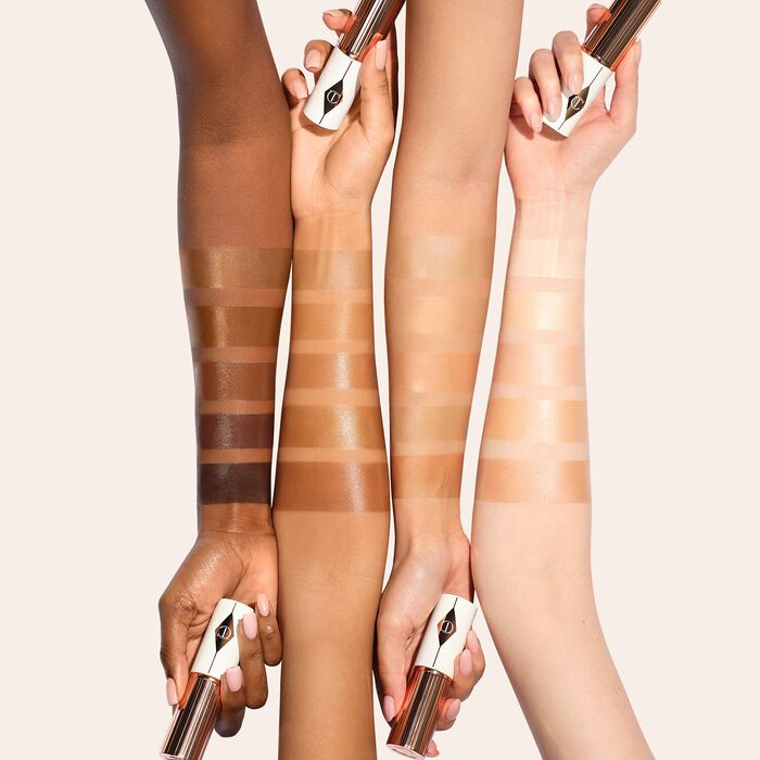 Charlotte Tilbury Unreal Skin Sheer Glow Tint - Stick base de maquillaje hidratante Envío gratis