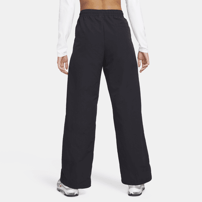 Nike Nike Sportswear Everything WovensPantalón de talle medio con dobladillo abierto - Mujer Los más vendidos
